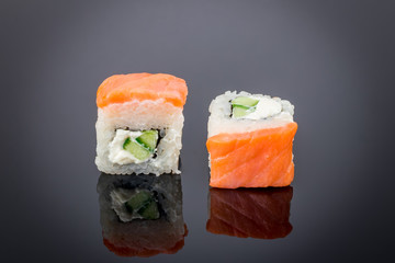 Philadelphia roll on black with reflection