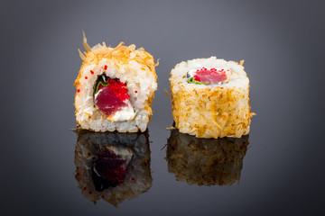 Roll Bonito on black with reflection