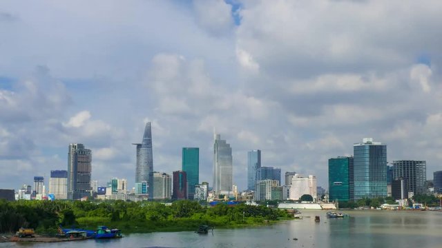 Timelapse or time lapse video of high building and skyscraper in center of Ho Chi Minh city. Royalty high-quality free stock footage time lapse of Ho Chi Minh City with development buildings