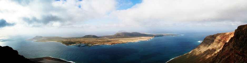 Naklejka na ściany i meble Small island off the coast of Lanzarote, Canary Islands