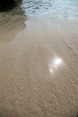 close up of shallow Mediterranean sea water in summer sun.