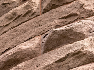 Closeup stone wall, old, summer.