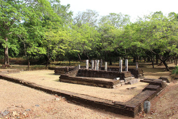 Fototapeta na wymiar The path, people, and ruins around Polonnaruwa Ancient City
