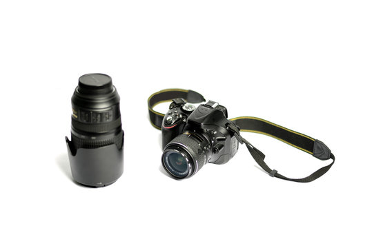 Digital SLR Camera and lens isolated on white background