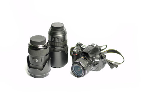 Digital SLR Camera and lens isolated on white background