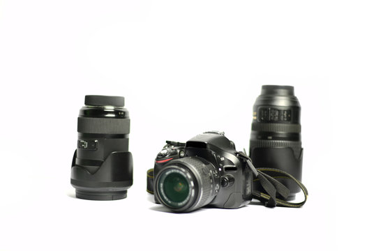 Digital SLR Camera and lens isolated on white background