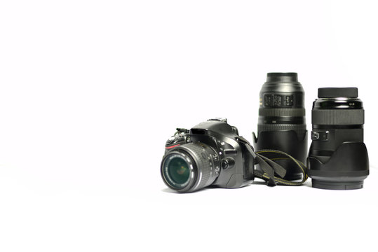 Digital SLR Camera and lens isolated on white background