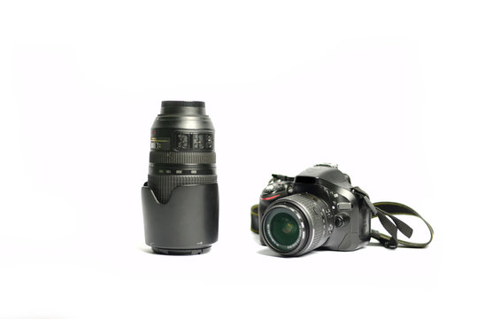 Digital SLR Camera and lens isolated on white background