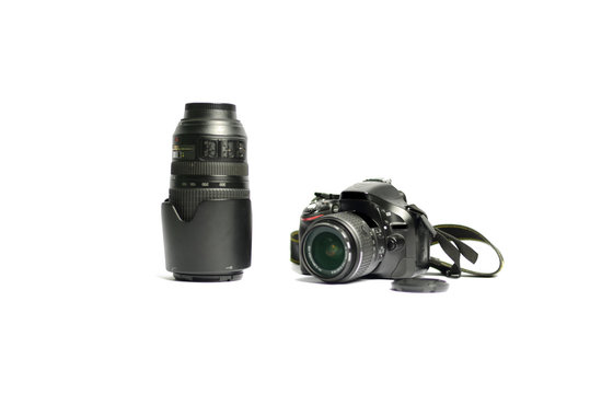 Digital SLR Camera and lens isolated on white background