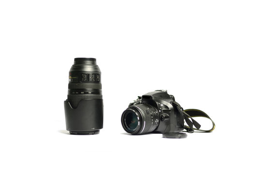 Digital SLR Camera and lens isolated on white background