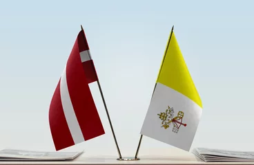 Foto op Canvas  Two flags of Latvia and Vatican City © Oleksandr