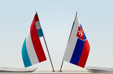 Two flags of Luxembourg and Slovakia
