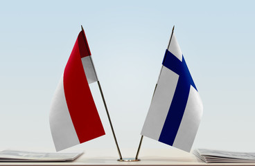 Two flags of Monaco and Finland