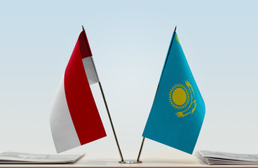 Two flags of Monaco and Kazakhstan