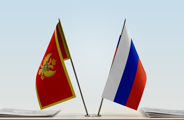 Two flags of Montenegro and Russia