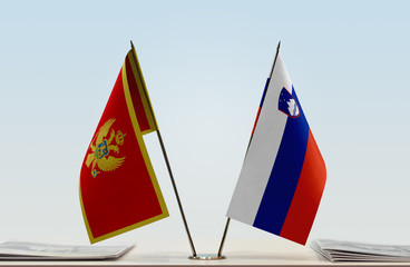 Two flags of Montenegro and Slovenia