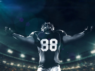 american football player celebrating after scoring a touchdown © .shock