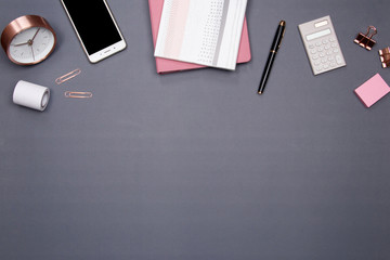 Woman home office desk . Table desk with stationery and office supplies on grey background. Flat...