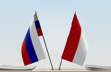 Fototapeta premium Two flags of Russia and Monaco