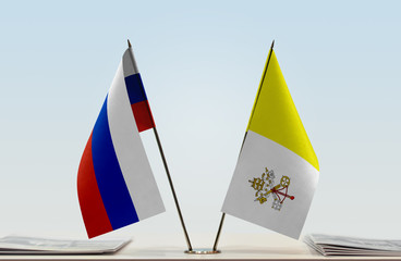 Two flags of Russia and Vatican City