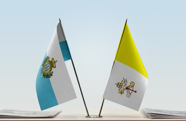 Two flags of San Marino and Vatican City