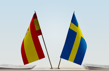 Two flags of Spain and Sweden