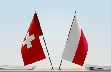 Two flags of Switzerland and Poland