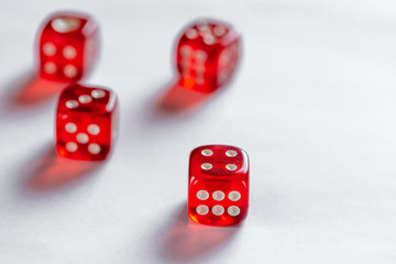 Red dice concept for business risk, chance, good luck or gambling on white background