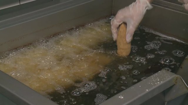 pies are fried in boiling oil