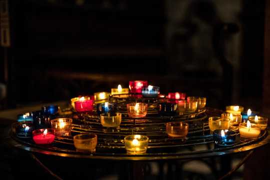 Lit candles in Notre Dame de Paris