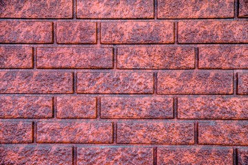 Obraz premium background of dark orange brick laid horizontally 