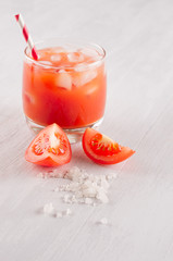 Summer fresh drink - cold alcoholic cocktail bloody Mary - pulpy red tomato juice on light white...