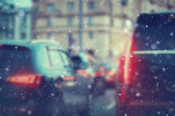 blurred transport background snow / traffic on a winter highway, seasonal auto concept, blurry auto texture, traffic jams