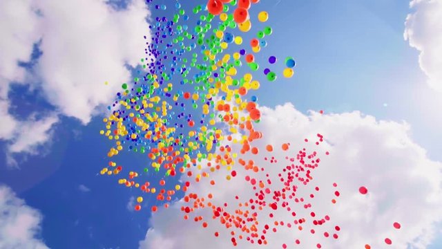 variety colorfull baloons in the scky with clouds and sun