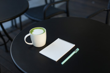 Matcha latte and stationery