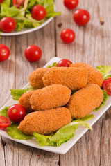 Supplì, italian fried rice balls.