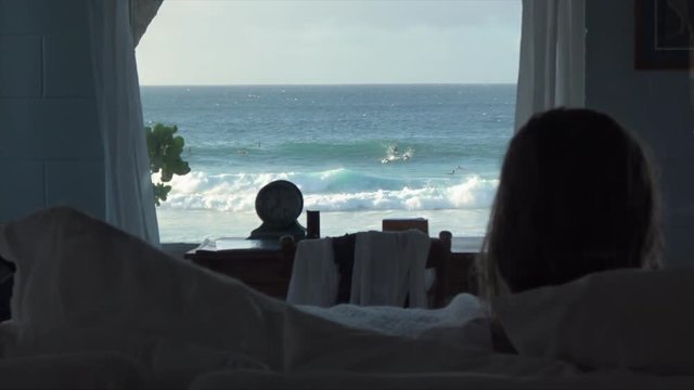 Surfers house from inside. home with ocean view watching surfers from inside