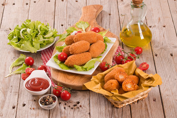 Supplì, italian fried rice balls.