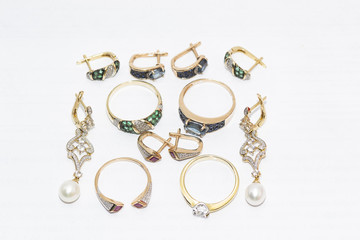 women's jewelry with emeralds, pearls, rubies, topaz