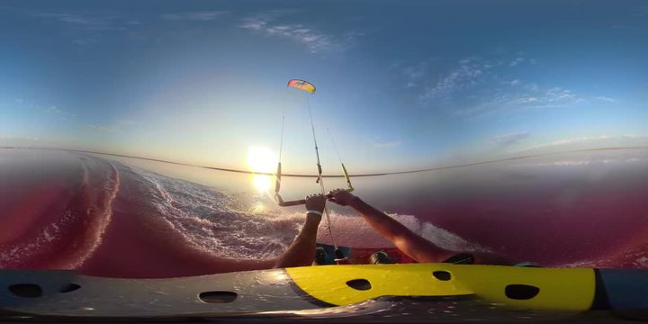 360 degrees, the man on kitesurf rushes along the pink lake