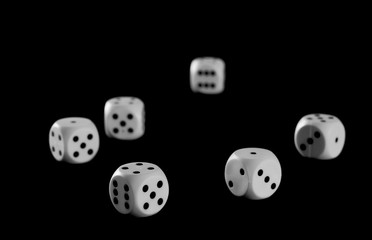 White gambling dice isolated on black background