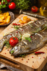 Grilled whole trout. Served with baked potatoes.