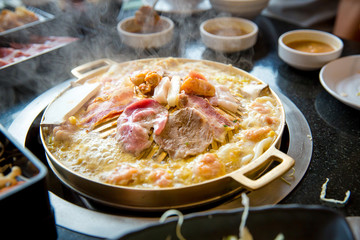 pork slice grilled on yakiniku hot pan.Barbecue japanese style. image for background and copy space.