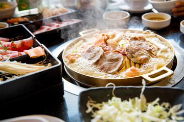 pork slice grilled on yakiniku hot pan.Barbecue japanese style. image for background and copy space.