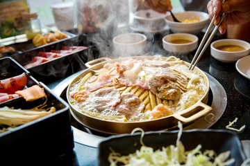 pork slice grilled on yakiniku hot pan.Barbecue japanese style. image for background and copy space.