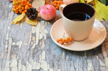 Workspace with golden leaves, notebook, coffee cup. Stylish office desk. Autumn or Winter concept. Flat lay, top view.