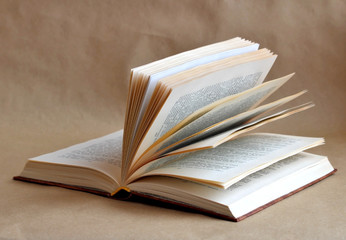 open book on a beige background. Education and knowledge background. Vintage books. School and information concept.