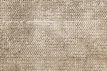 Grungy rusted metal surface in brown tone.