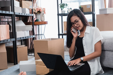 pretty asian woman receiving online order