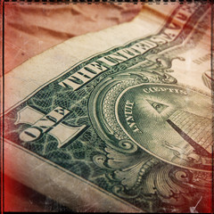one paper dollar on a background of cardboard. Web banner.